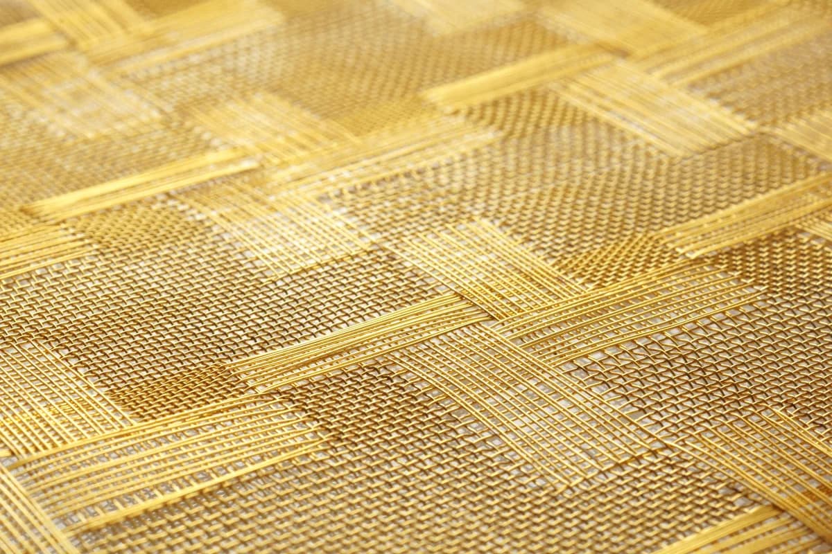 Finished woven architectural metal mesh detail used to separate geometry and finish approval