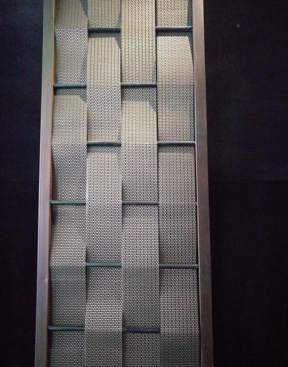 Interior wall panel architectural metal mesh detail