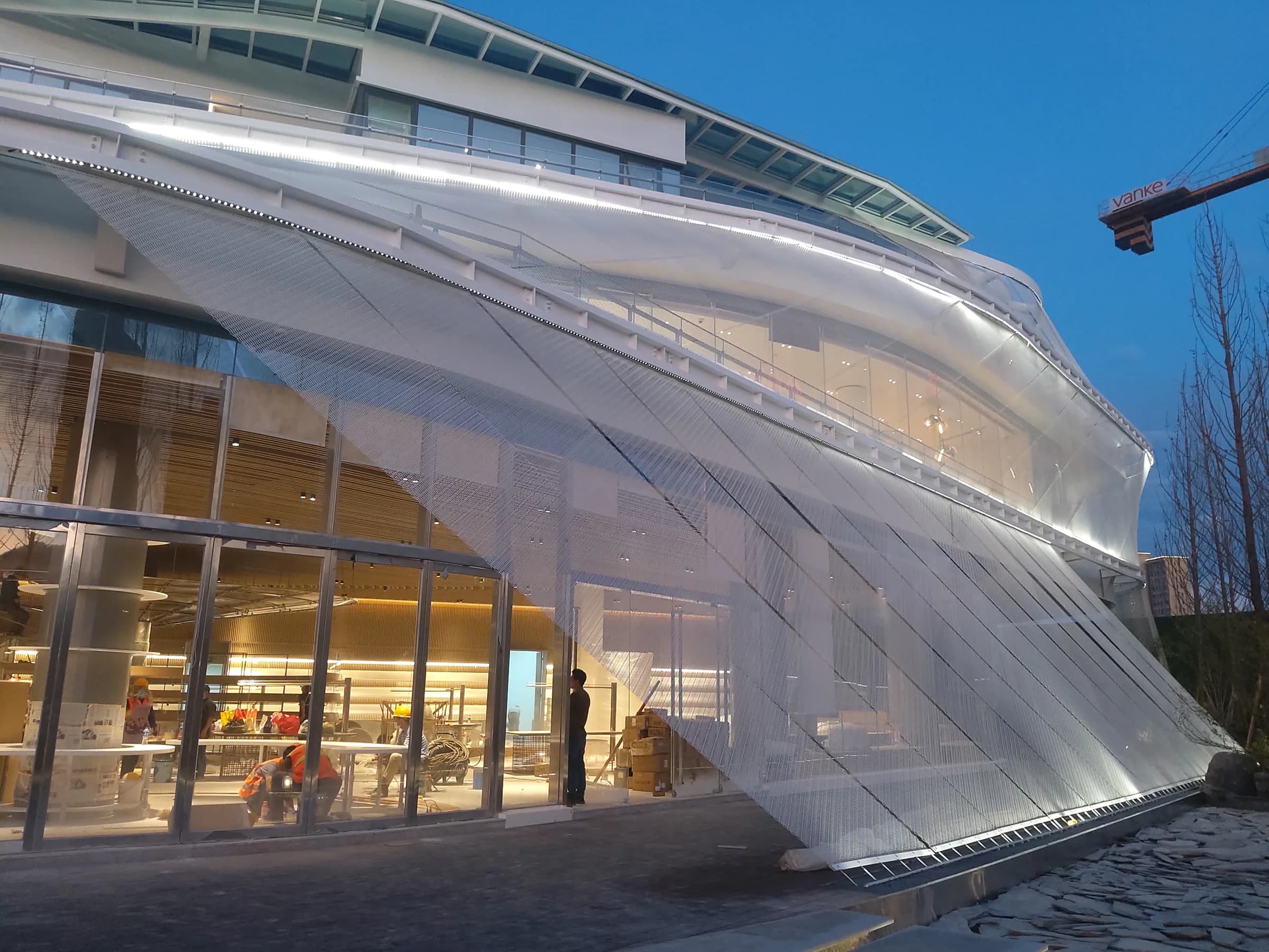 Architectural tensioned metal mesh facade project